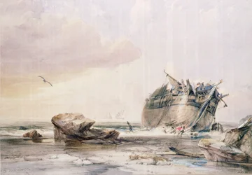 Rotsachtige kust met ontmanteld schip